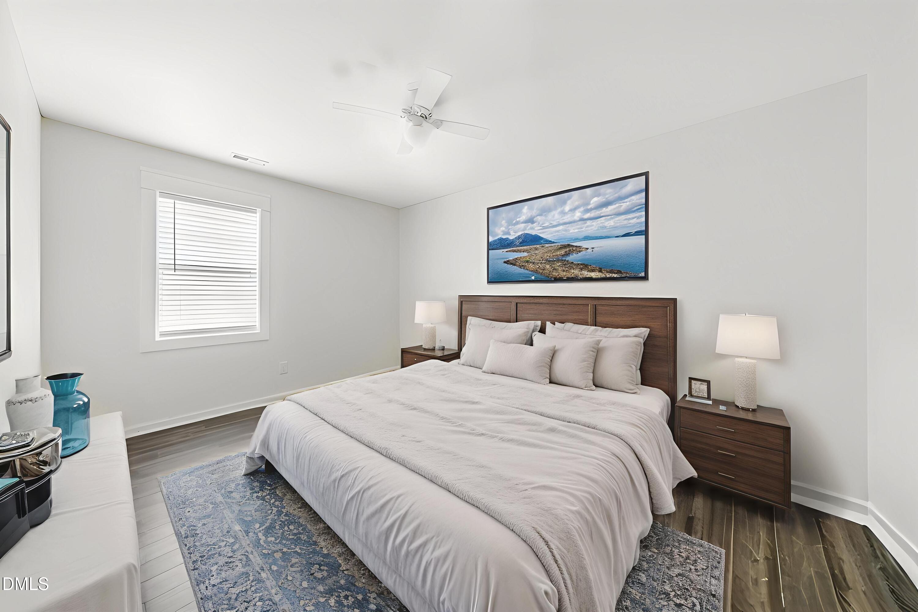 806 South Roxboro Street Durham, NC 27707 - Photo 13 of 25 a bedroom with bed and a window