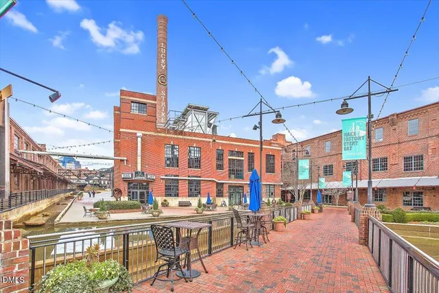 a city street filled with lots of tall buildings