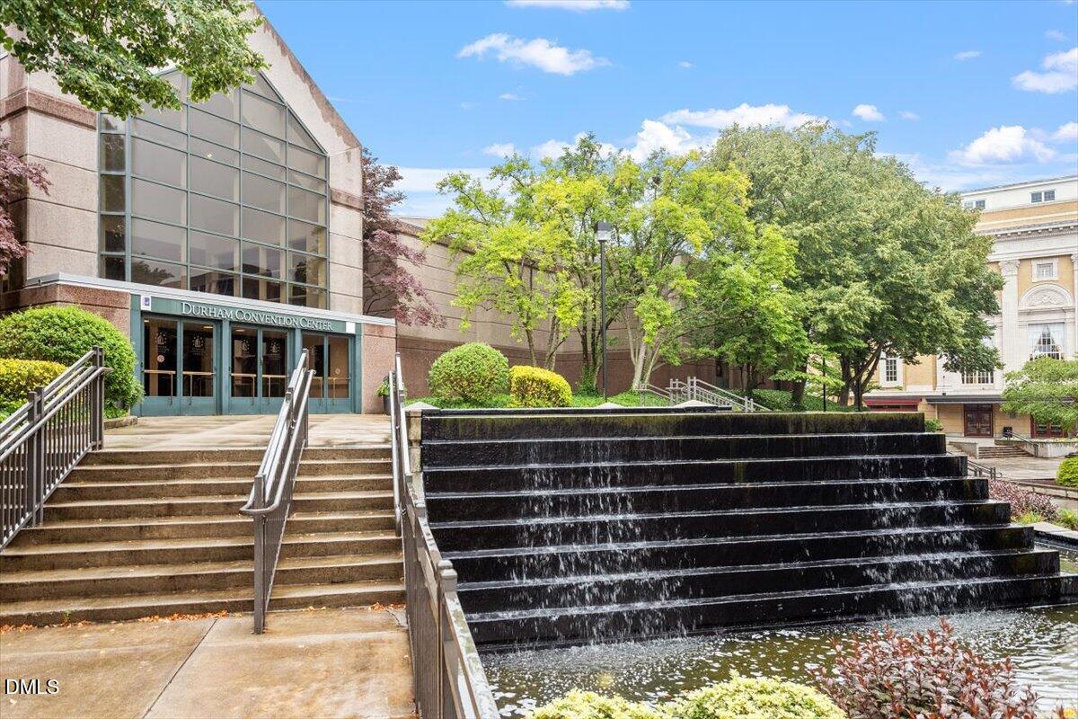 806 South Roxboro Street Durham, NC 27707 - Photo 21 of 25 a view of a yard with plants and wooden fence