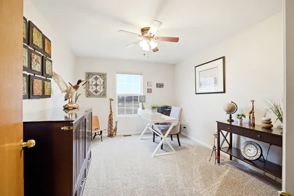 a view of livingroom with furniture and windows