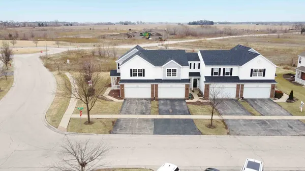 a view of a house with a ocean beach