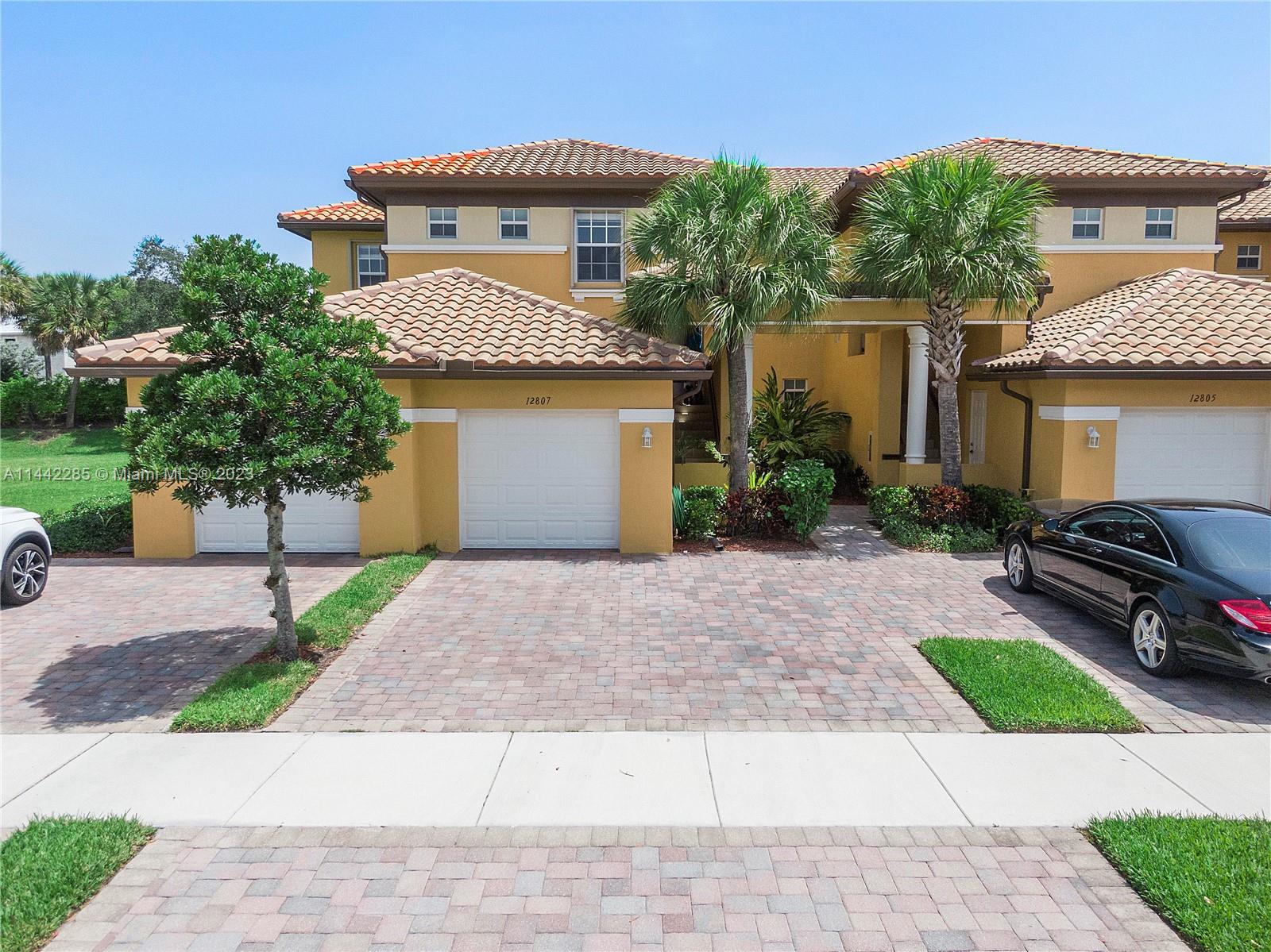 a car parked in front of a house