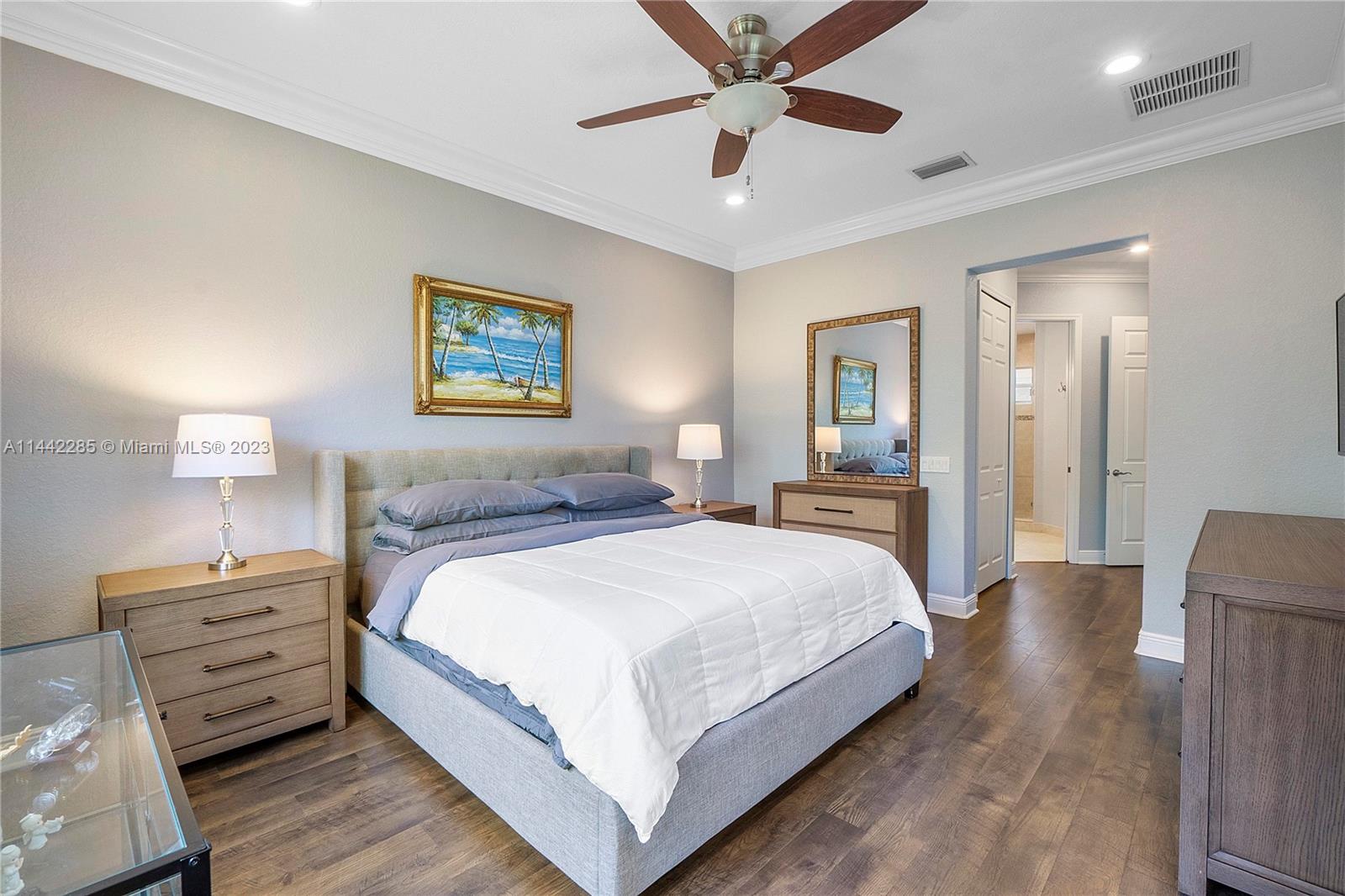 Heron Bay Parkland, FL 33076 - Photo 26 of 60 a bedroom with bed and window