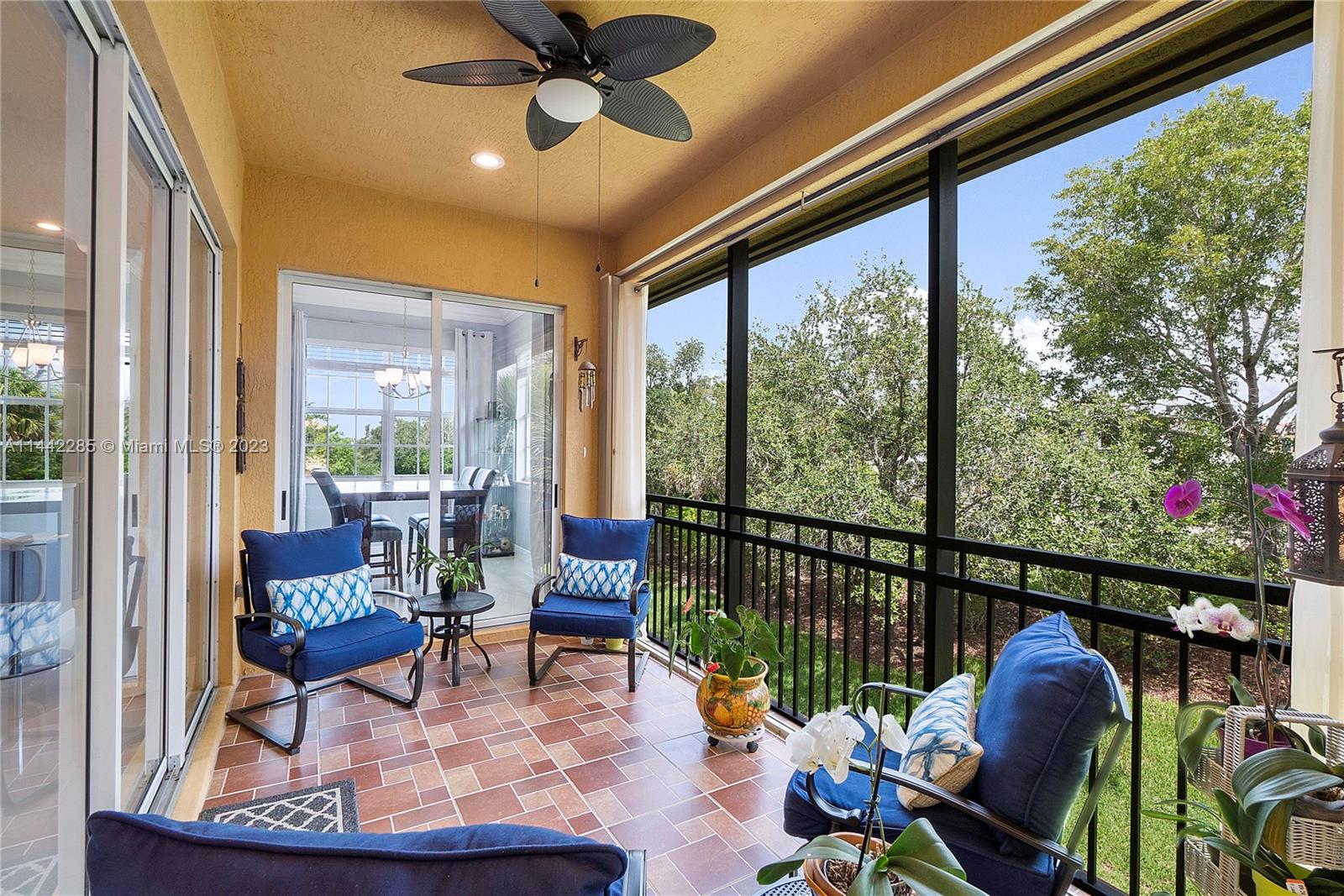 Heron Bay Parkland, FL 33076 - Photo 40 of 60 a living room with furniture and a large window