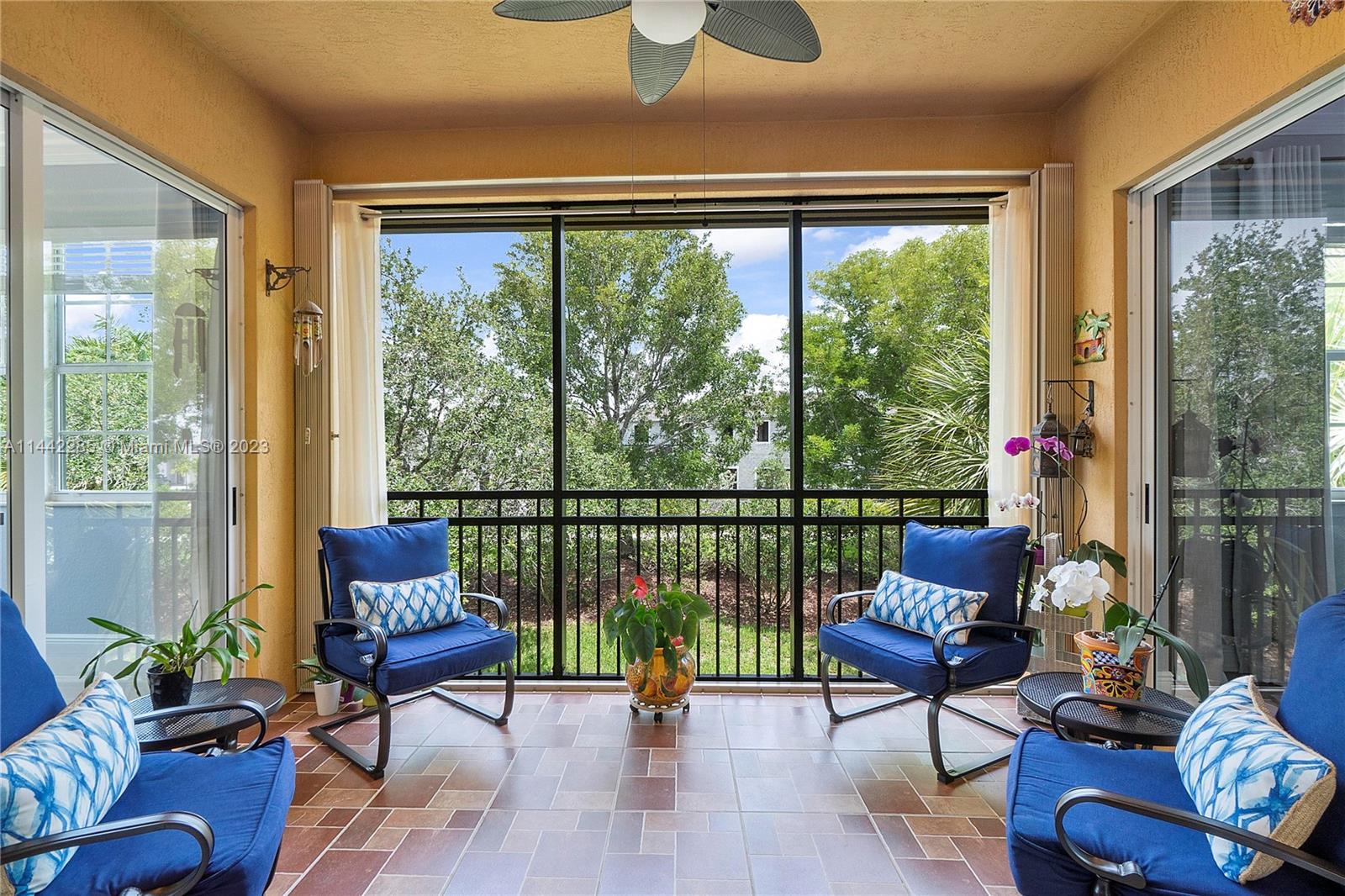 Heron Bay Parkland, FL 33076 - Photo 41 of 60 a living room with furniture and a window