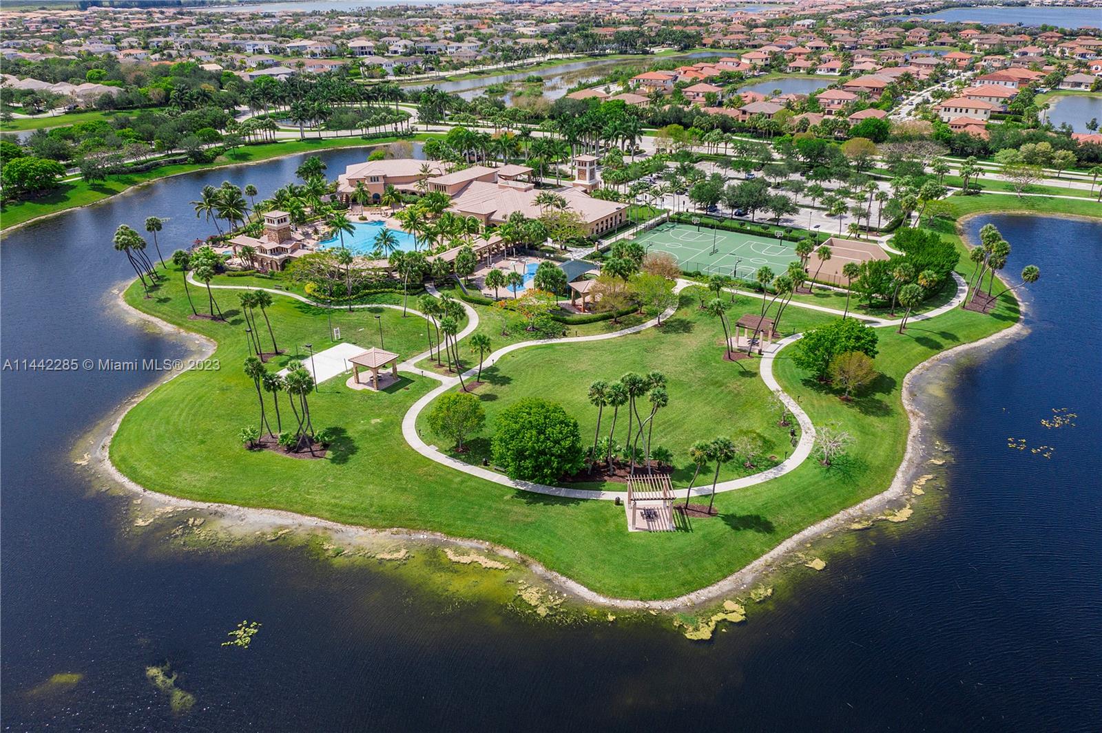 Heron Bay Parkland, FL 33076 - Photo 50 of 60 a view of a lake in middle of the house