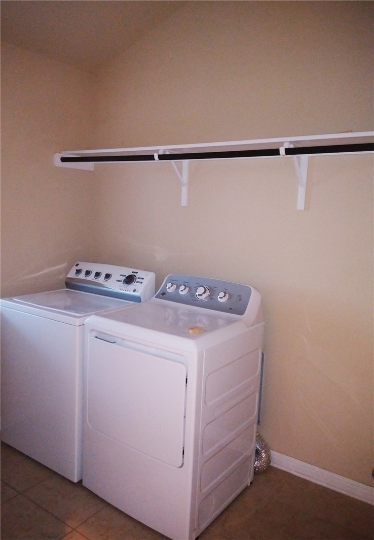 348 Stone View Trail Austin, TX 78737 - Photo 19 of 26 Washer and dryer in laundry room available for tenant's use