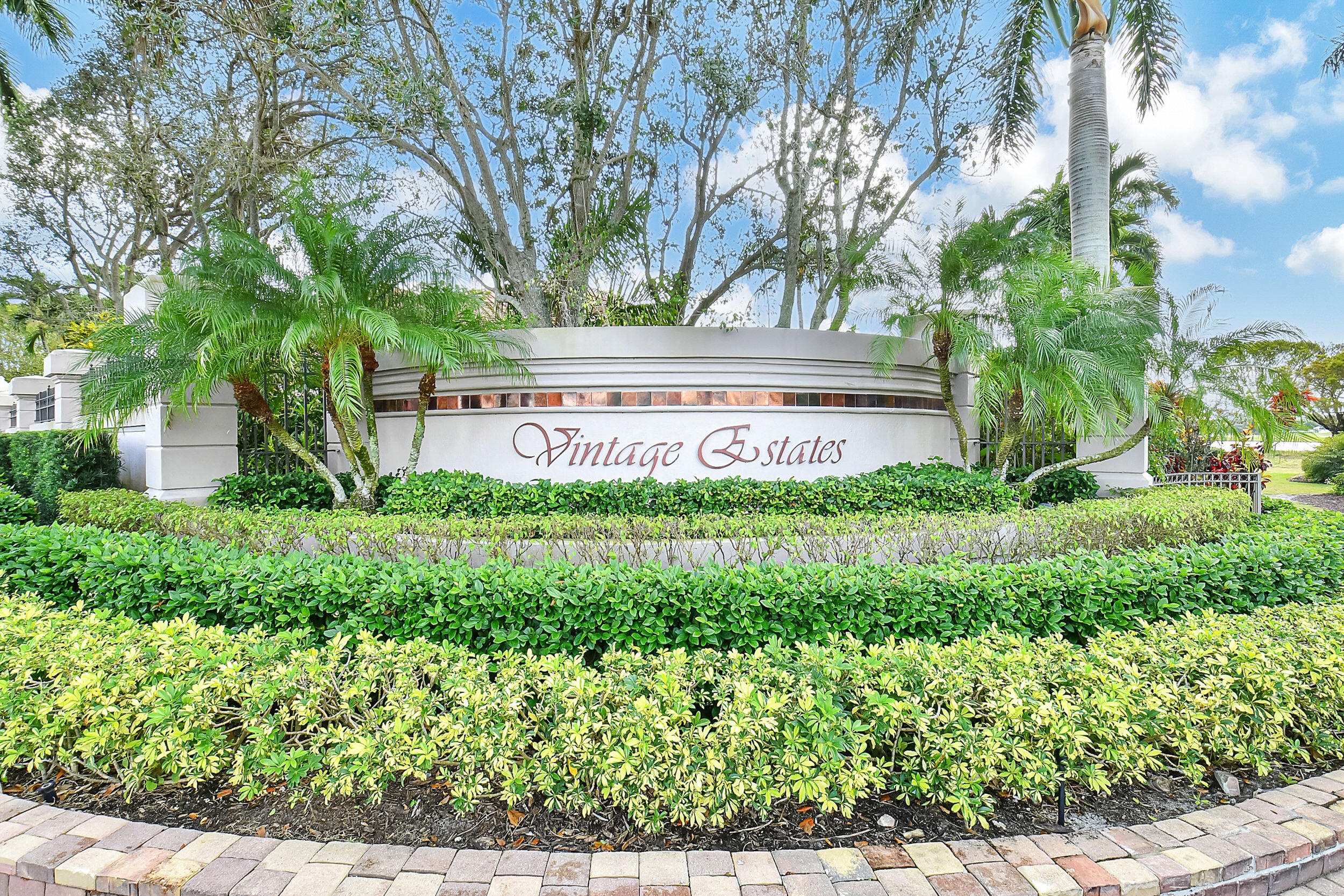 2589 Northwest 59th Street Boca Raton, FL 33496 - Photo 1 of 13 a view of a house with a yard and garden