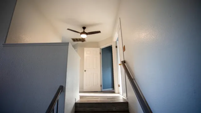 a bathroom with a bathtub and a sink