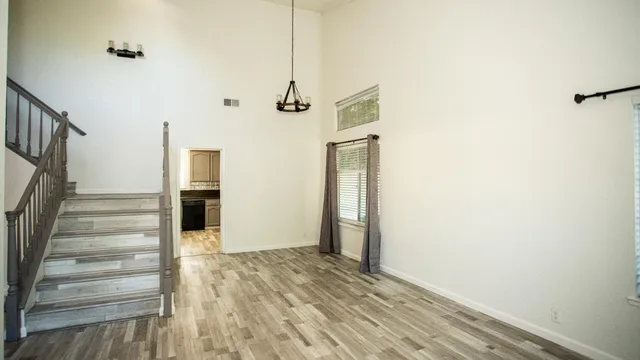 a view of entryway with wooden floor