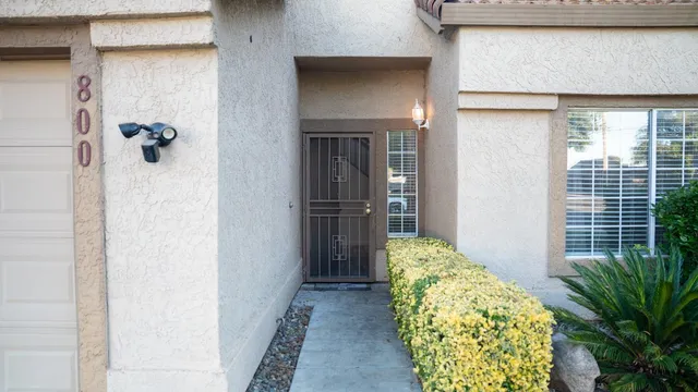a kitchen with a sink stove top oven and cabinets