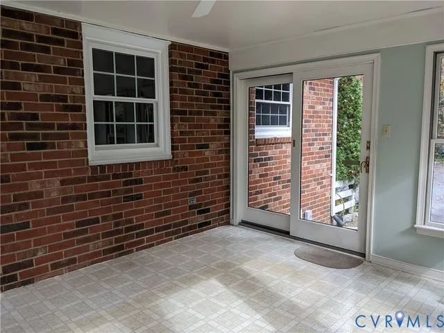 a view of livingroom with furniture and window