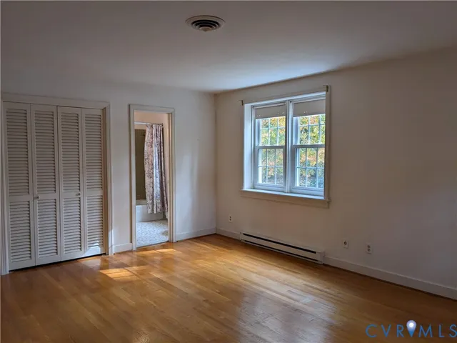 a view of a room that has a window in it