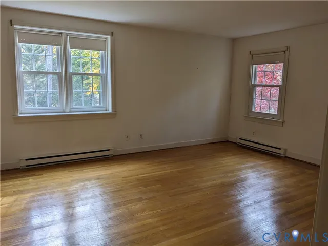 a view of a room that has a window in it