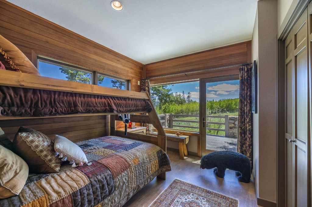 118 Topaz Road Silverthorne, CO 80498 - Photo 22 of 34 Sun room offers access to decks and views of meadow to the south where elk graze