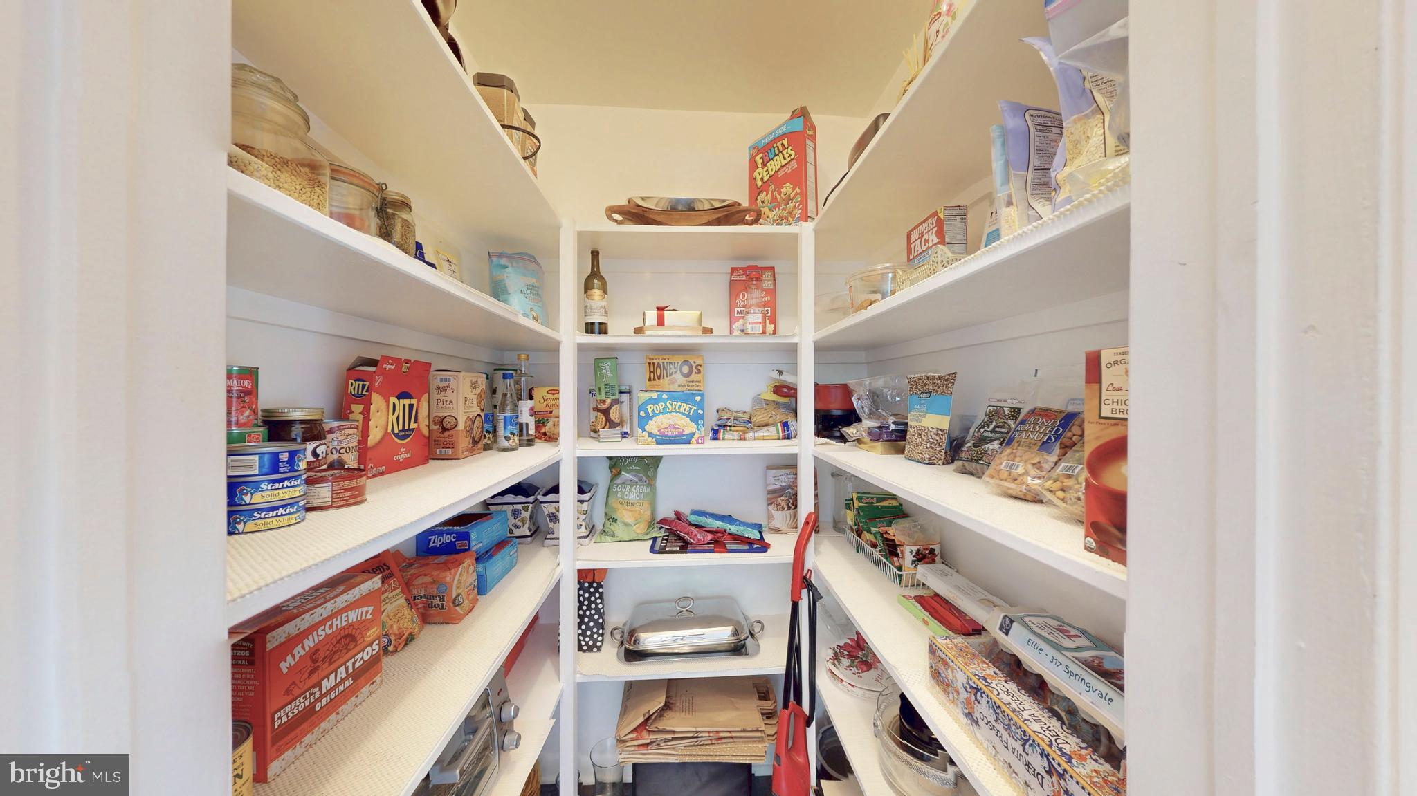 317 Springvale Road Great Falls, VA 22066 - Photo 19 of 98 a utility room with lots of clutter and cabinets