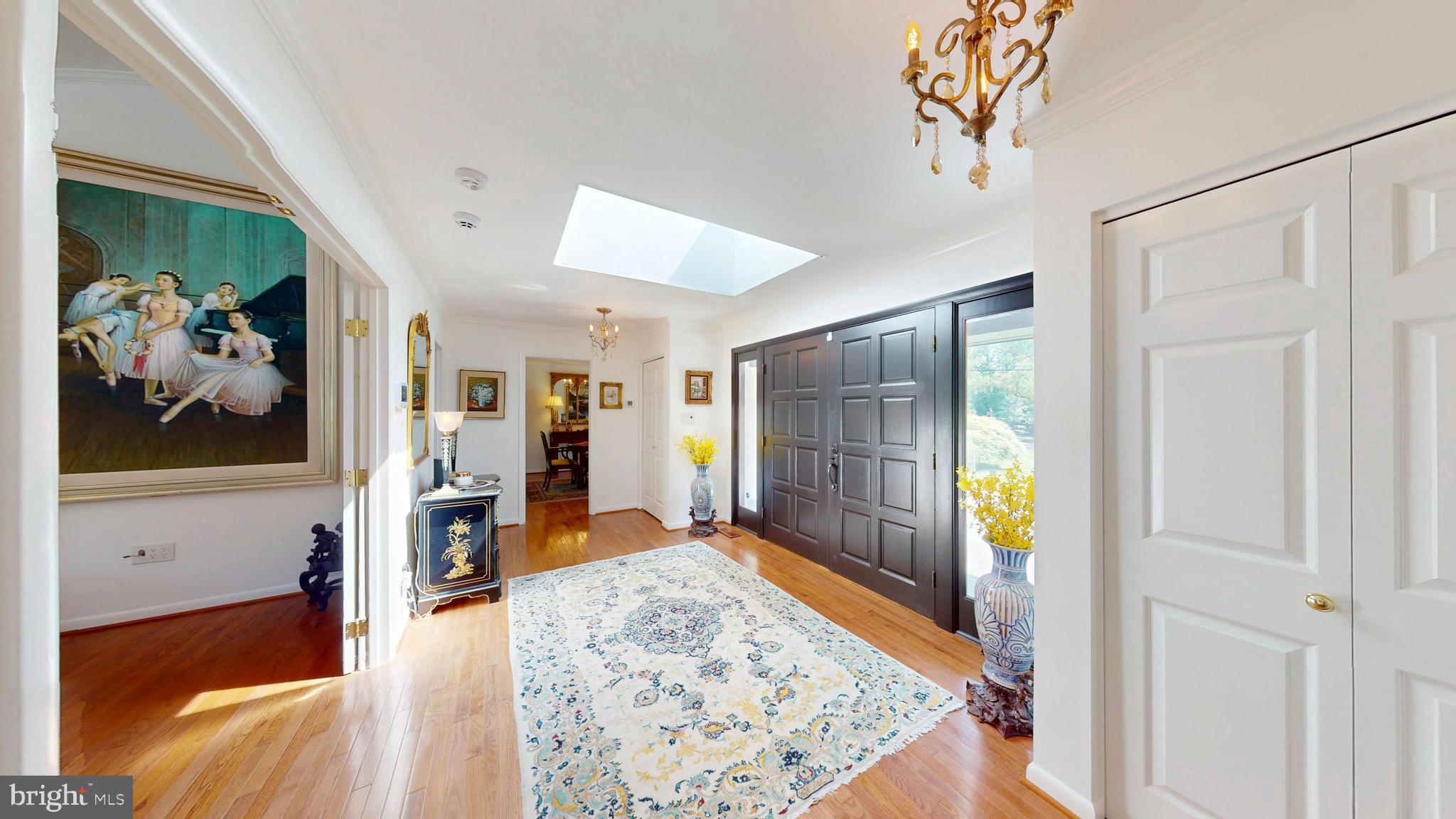 317 Springvale Road Great Falls, VA 22066 - Photo 3 of 98 a view of a hallway view with living room and dining room