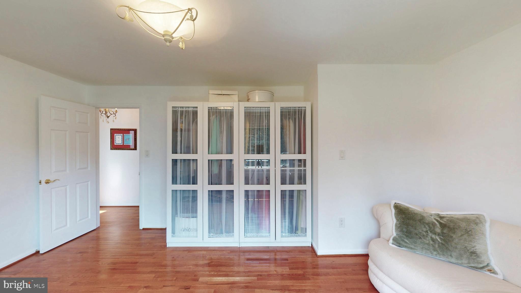317 Springvale Road Great Falls, VA 22066 - Photo 39 of 98 a view of livingroom with furniture and wooden floor