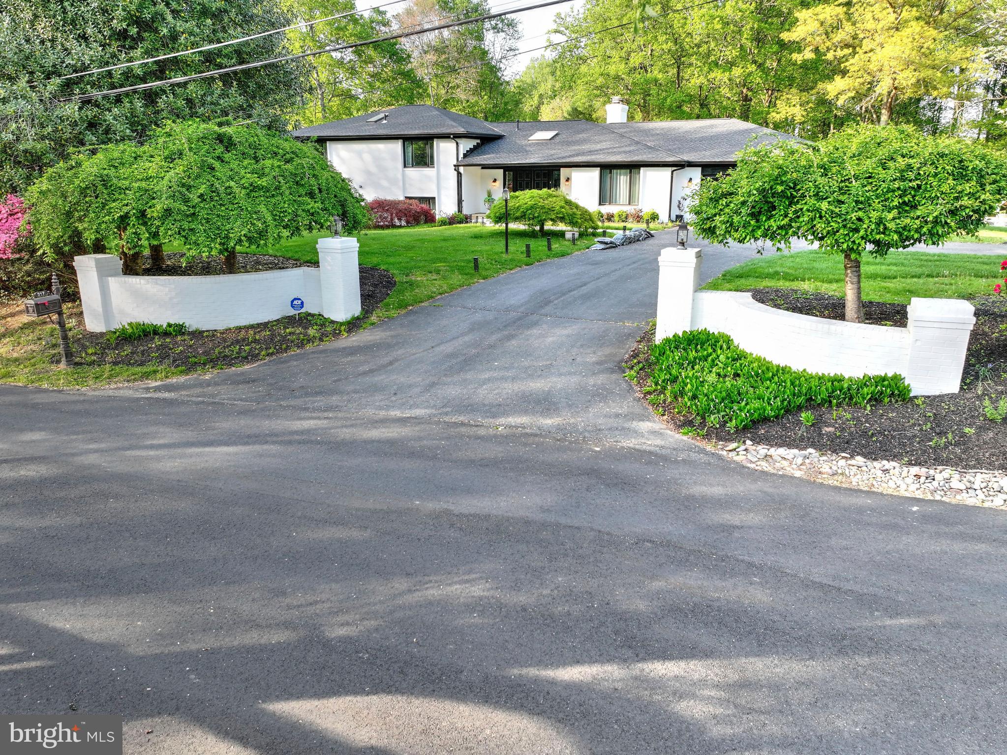 317 Springvale Road Great Falls, VA 22066 - Photo 58 of 98 a front view of a house with a yard and trees