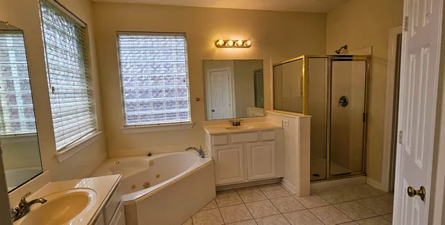 a bathroom with a sink a toilet and a bathtub