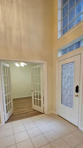 an empty room with windows