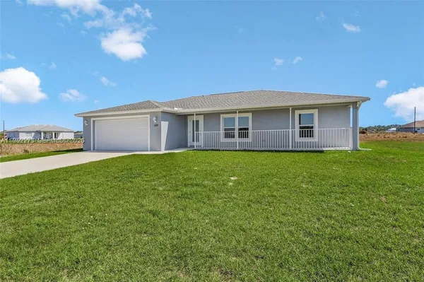 a house view with a garden space