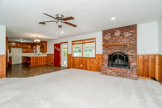 a view of kitchen with wooden floor