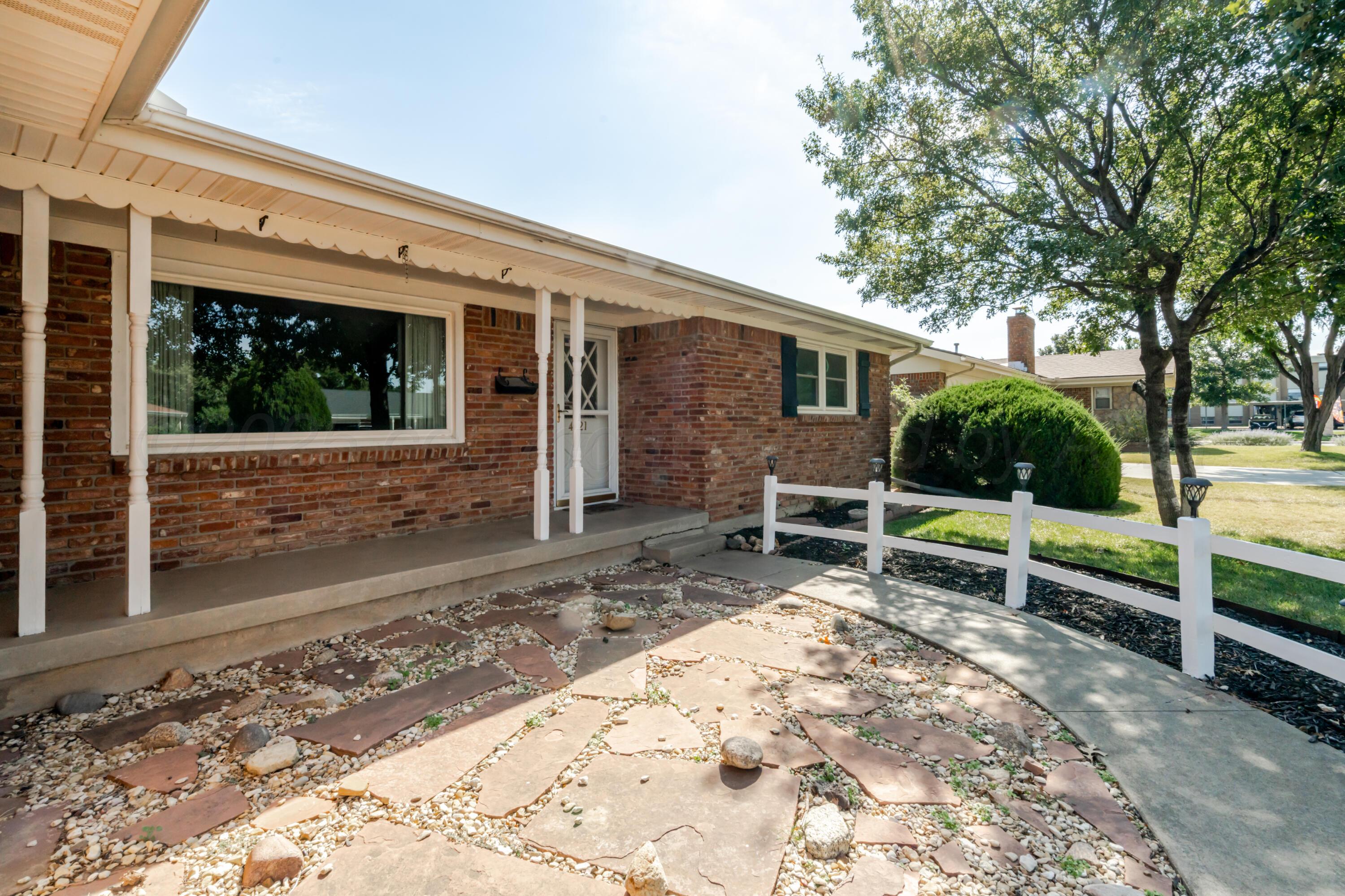 4721 Cherokee Trail Amarillo, TX 79109 - Photo 2 of 42 a view of a house with backyard and sitting area