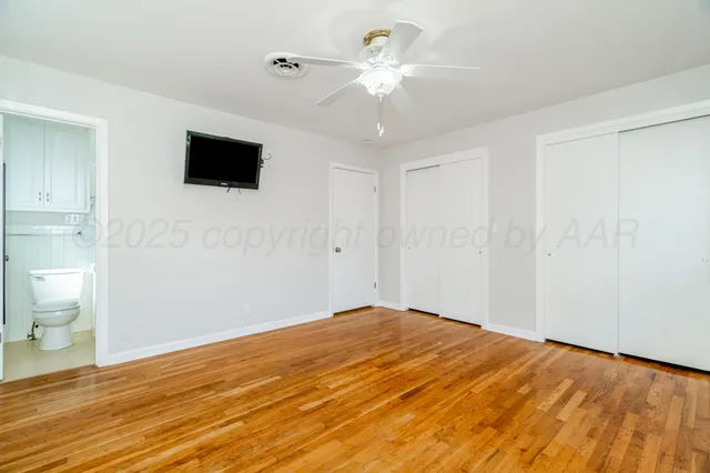a bathroom with a sink and vanity