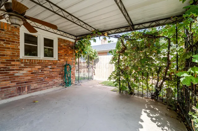 a view of a room with wooden walls