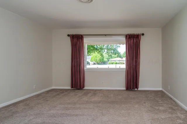 a view of a room with a window