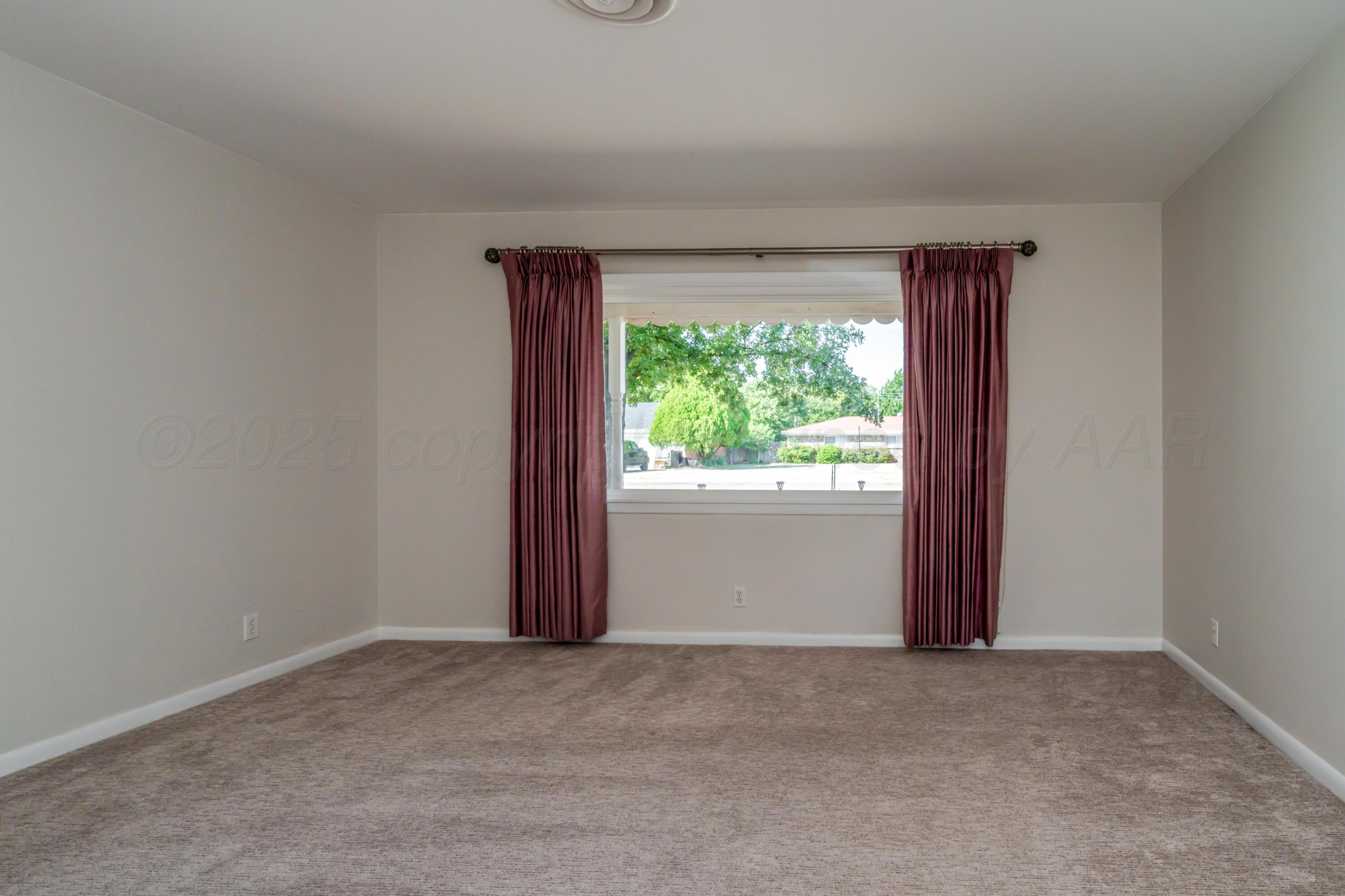 4721 Cherokee Trail Amarillo, TX 79109 - Photo 7 of 42 a view of a room with a window