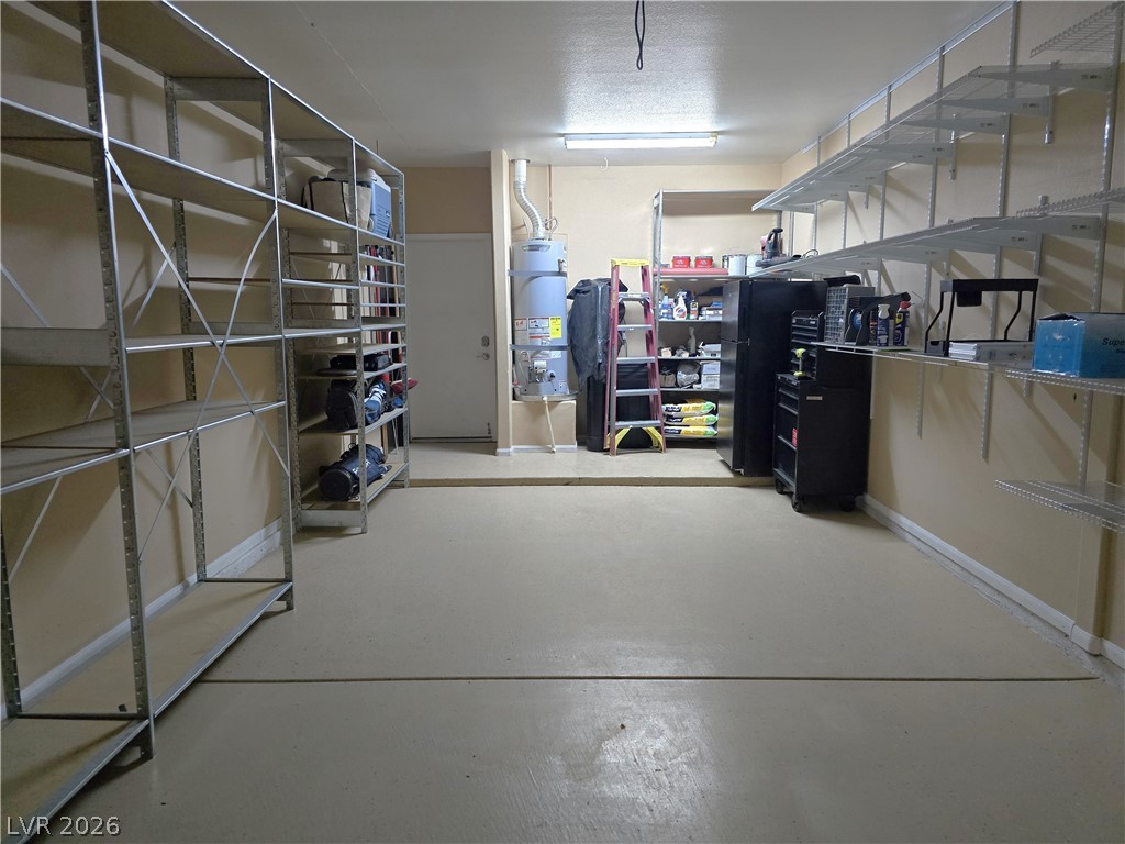 2050 West Warm Springs Road, Unit 2422 Henderson, NV 89014 - Photo 33 of 44 This spacious garage offers versatile storage solutions for any need.