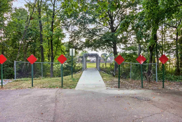 a view of road with sign board