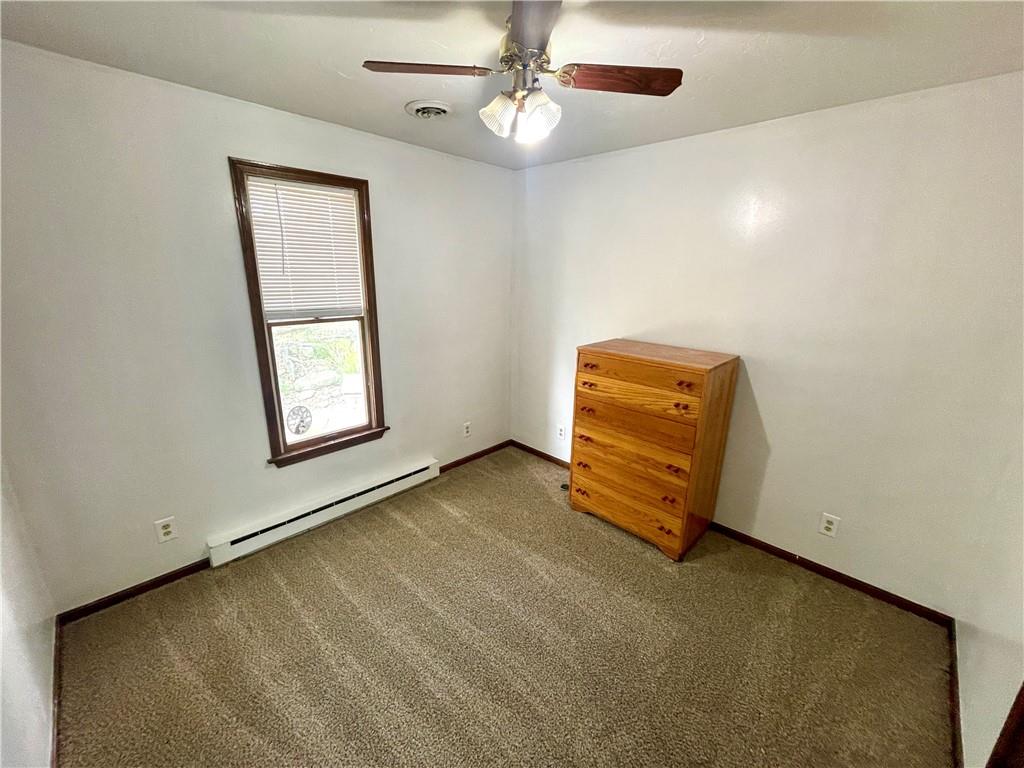 418 Forrest Hill Road Industry, PA 15052 - Photo 23 of 44 an empty room with windows and fan
