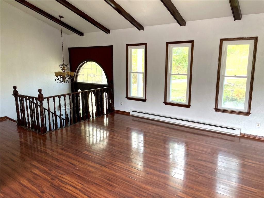 418 Forrest Hill Road Industry, PA 15052 - Photo 9 of 44 a view of a furniture window and wooden floor