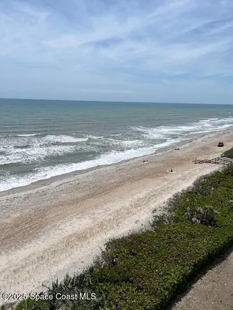 a view of beach and ocean