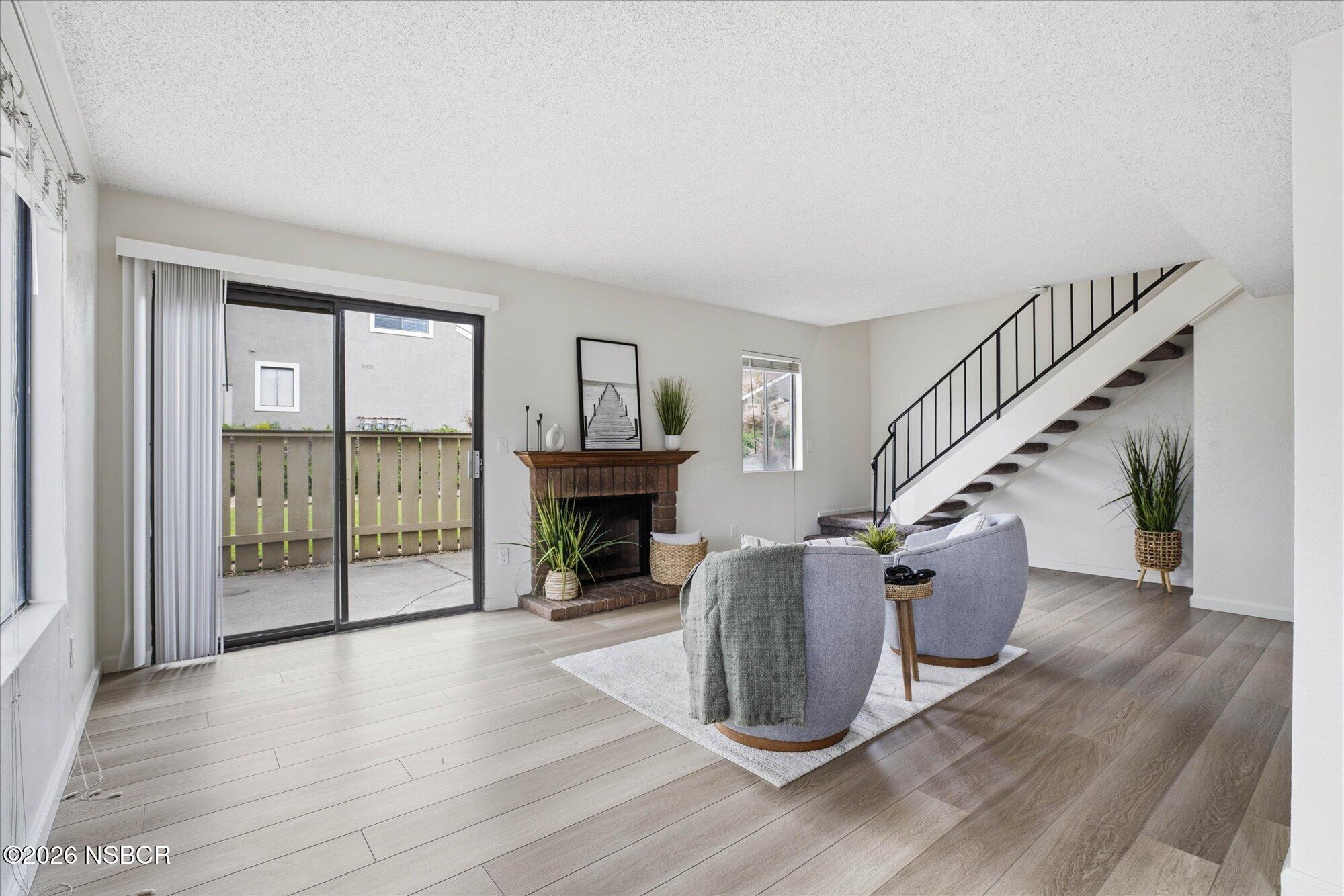 1192 Sumner Place, Unit D Santa Maria, CA 93455 - Photo 2 of 18 a view of entryway and hall with wooden floor