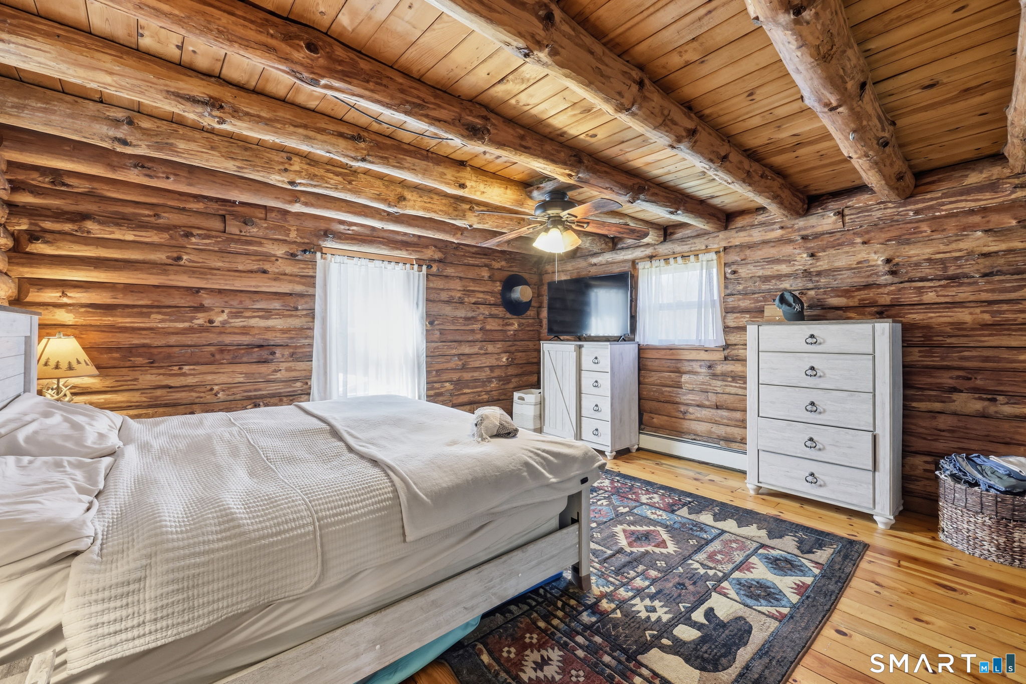 800 Gaylord Mountain Road Hamden, CT 06518 - Photo 22 of 40 a bed sitting in a spacious bedroom next to a window