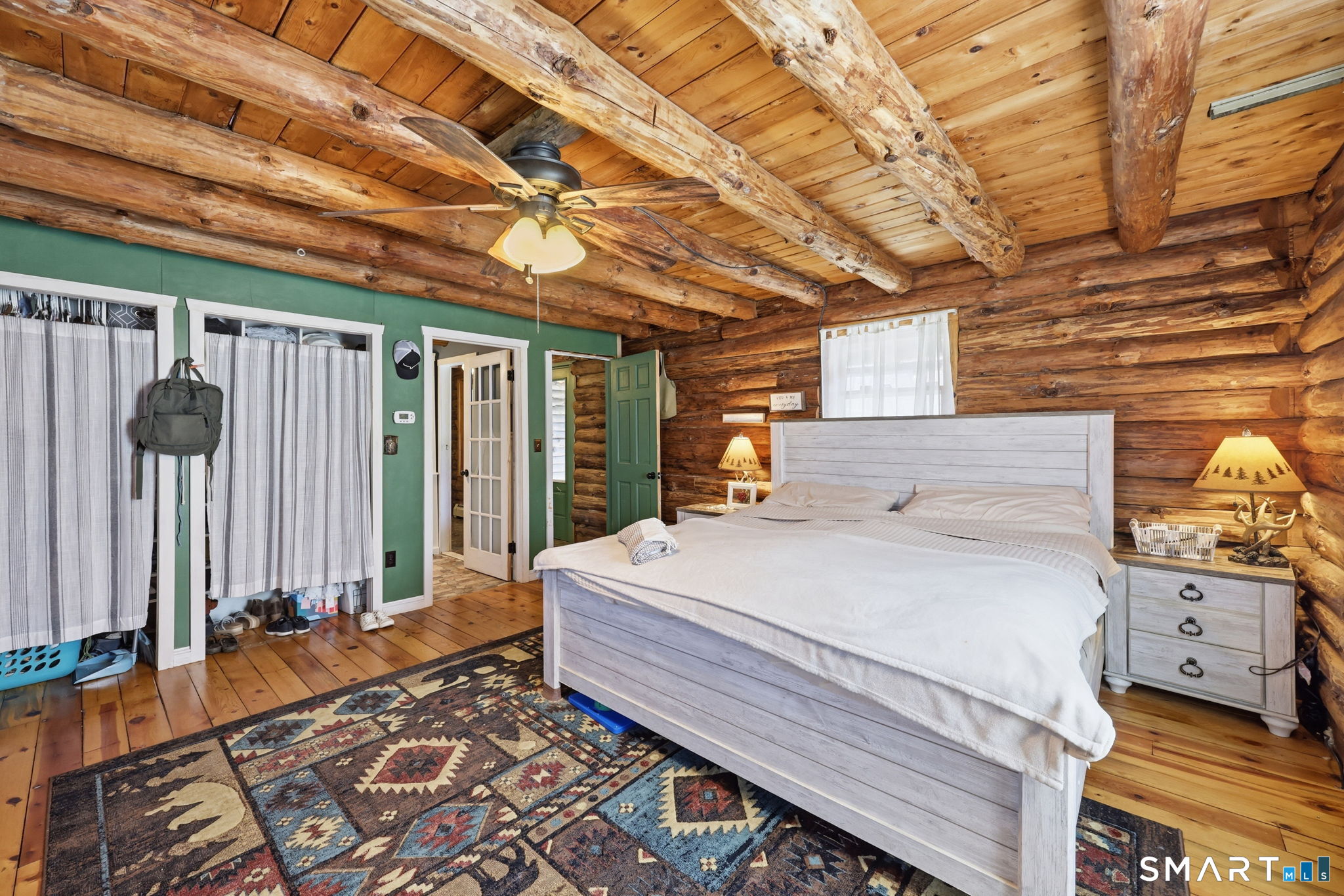 800 Gaylord Mountain Road Hamden, CT 06518 - Photo 23 of 40 a bed sitting in a spacious bedroom next to a window