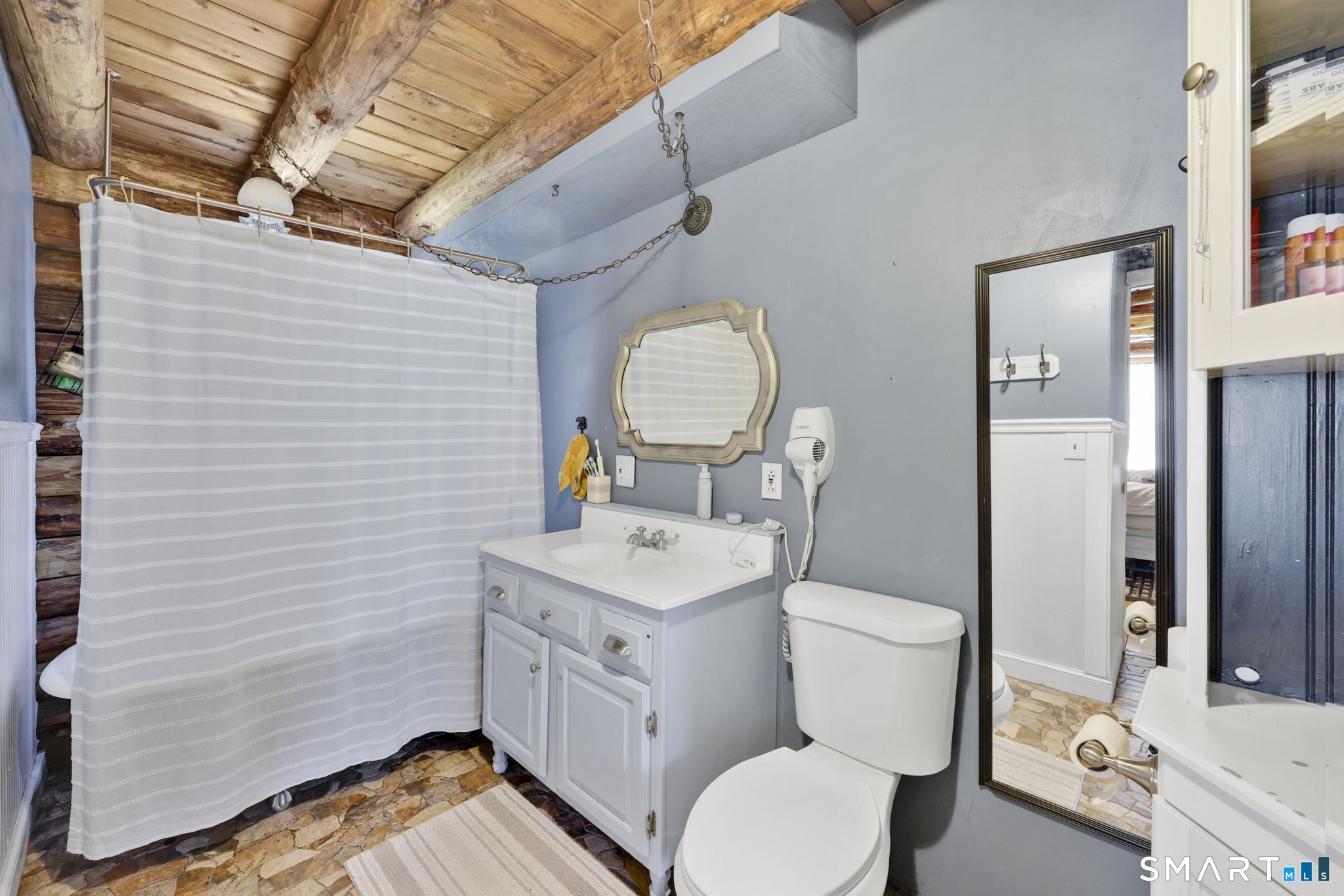 800 Gaylord Mountain Road Hamden, CT 06518 - Photo 24 of 40 a bathroom with a toilet sink vanity tub and mirror