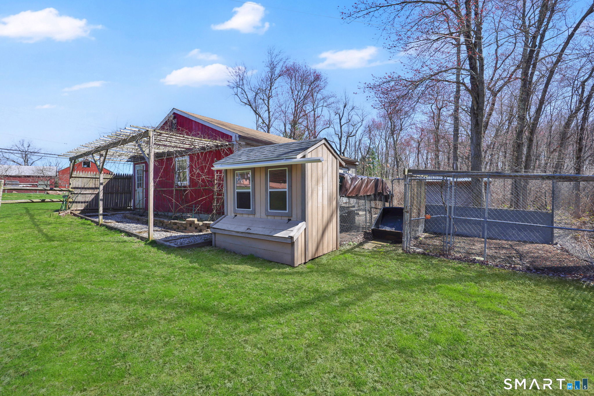 800 Gaylord Mountain Road Hamden, CT 06518 - Photo 37 of 40 a view of a house with a yard and sitting area