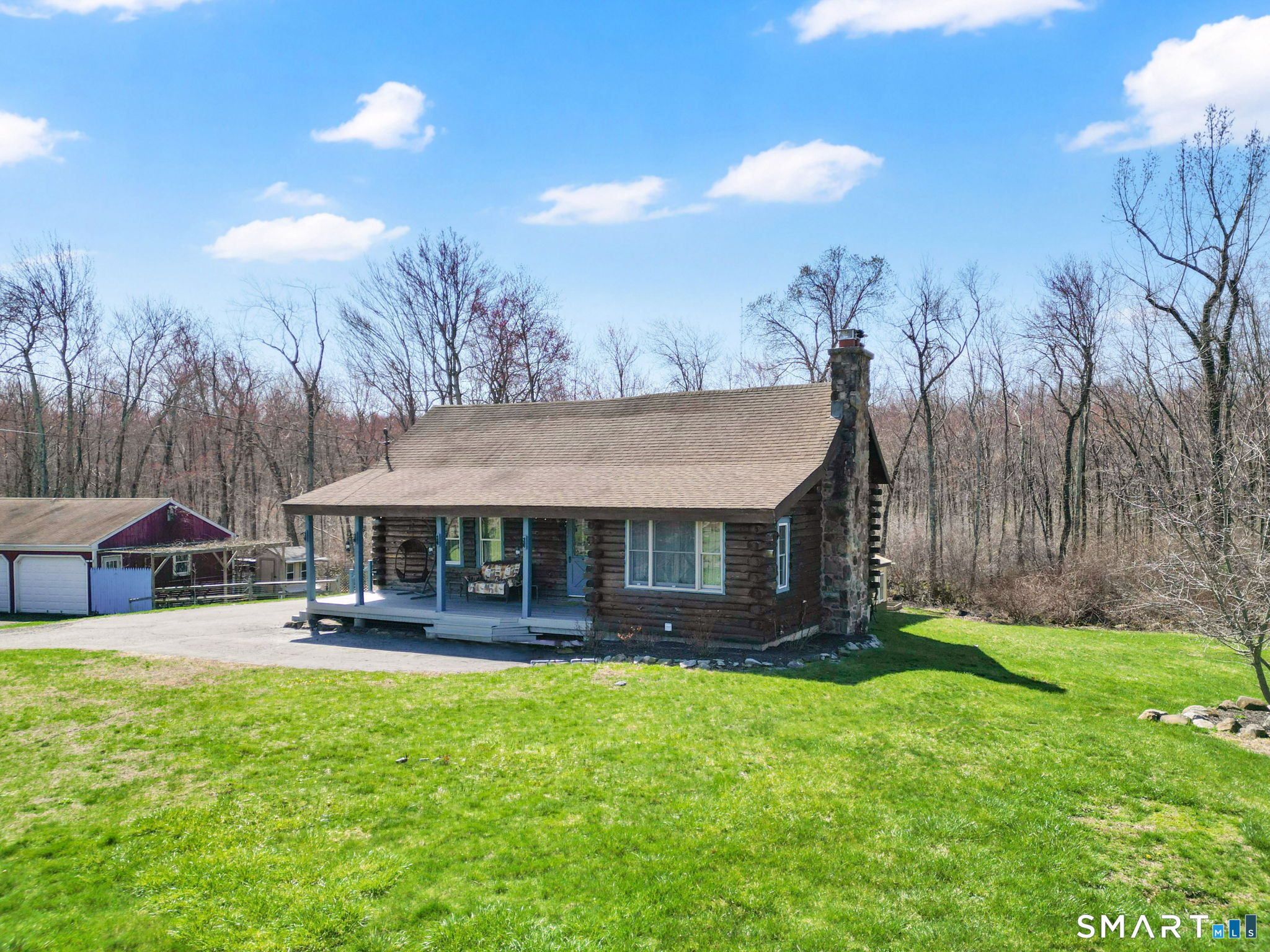 800 Gaylord Mountain Road Hamden, CT 06518 - Photo 38 of 40 a view of a house with a yard patio and sitting area