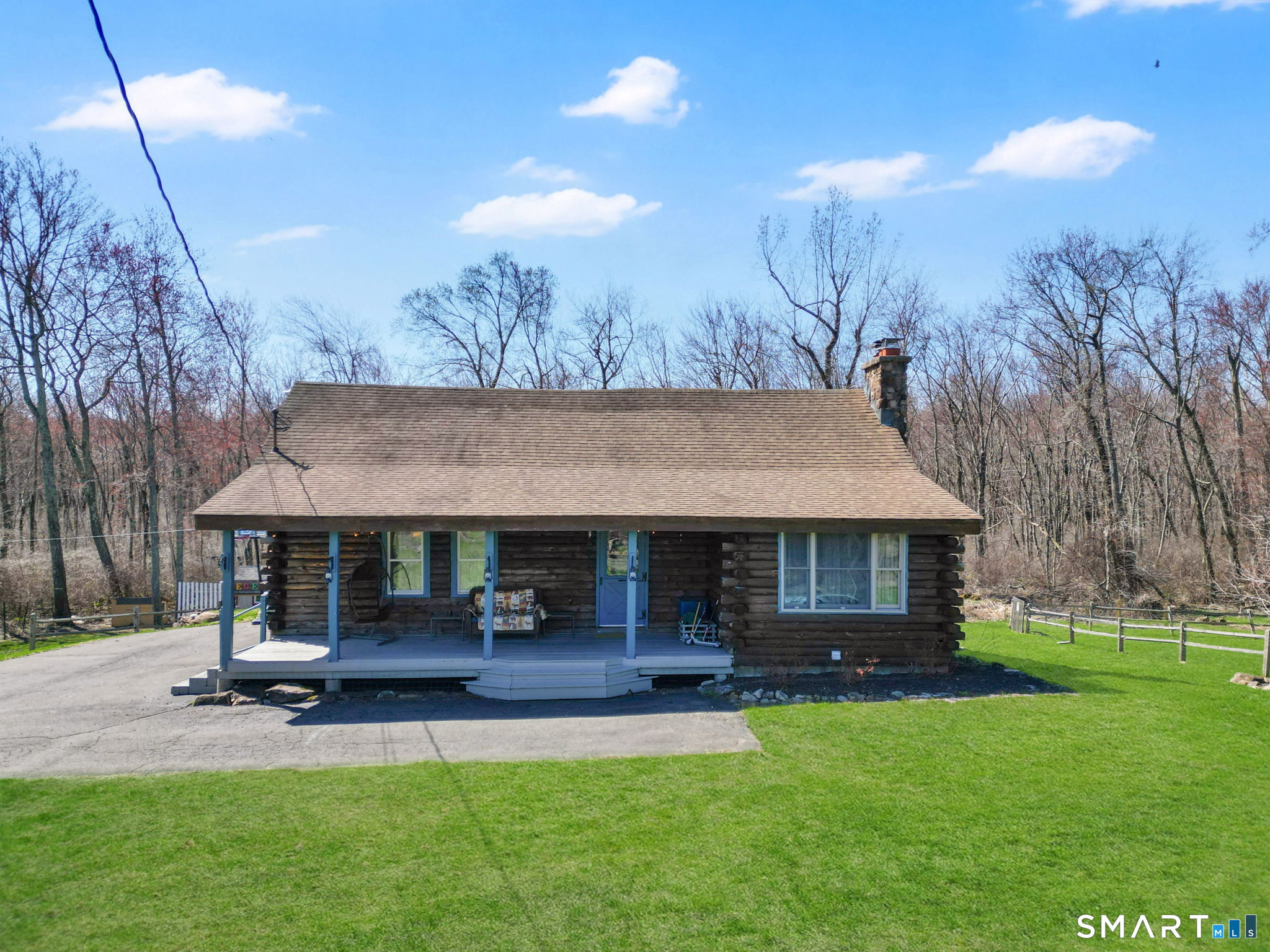 800 Gaylord Mountain Road Hamden, CT 06518 - Photo 39 of 40 a view of a house with patio and a yard