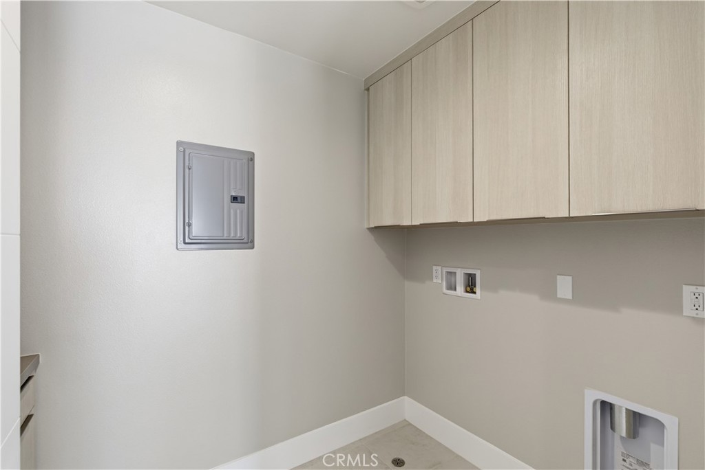 156 Apron Irvine, CA 92618 - Photo 38 of 40 a view of storage and utility room with window