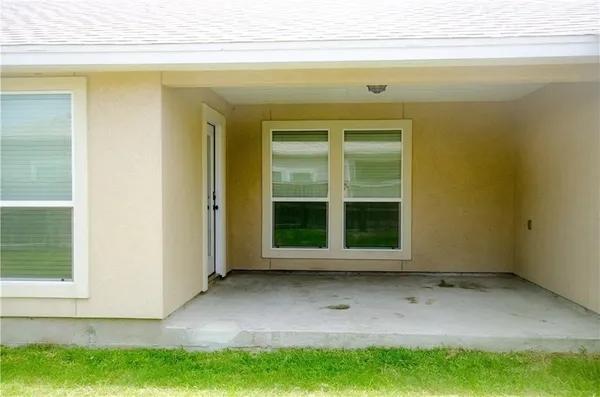 a view of a backyard of a house