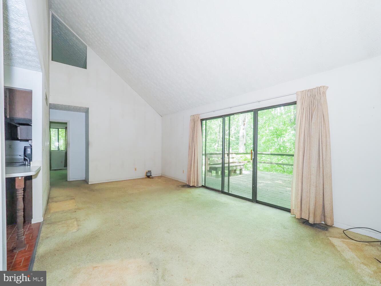 524 Ridge Road Annapolis, MD 21401 - Photo 13 of 58 a view of an empty room with glass door