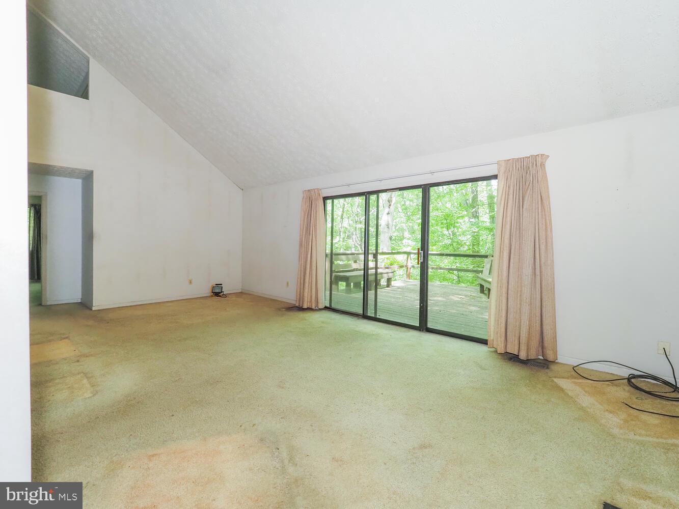 524 Ridge Road Annapolis, MD 21401 - Photo 14 of 58 a view of an empty room with a balcony