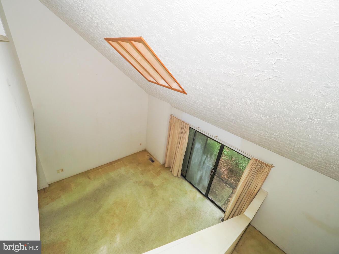 524 Ridge Road Annapolis, MD 21401 - Photo 35 of 58 a view of a room with staircase and white walls