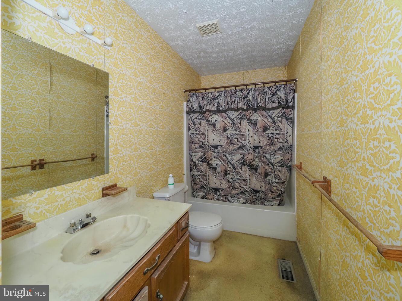 524 Ridge Road Annapolis, MD 21401 - Photo 45 of 58 a bathroom with a sink toilet and shower